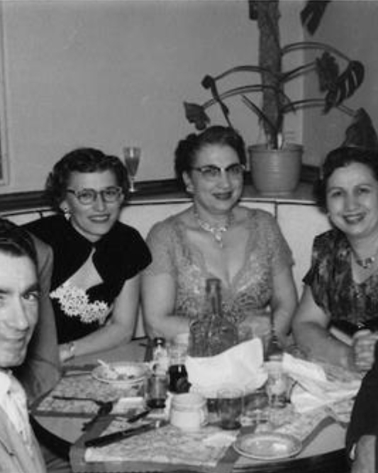 Photo taken at Gaetanos’ restaurant sometime in the 1950’s. Sitting left front person unknown, back left to right: Clarence 