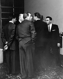 Smaldone family members in 1963. Left to right are Americus Quintana, Joe Salardino, Chauncey Smaldone, attorney Ed Barlock and Michael Tomeo. Barlock is explaining why Eugene 