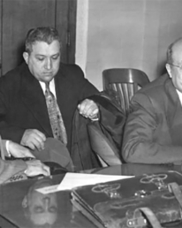 Clyde Smaldone sits with lawyers in 1951.