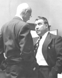 Clyde Smaldone talks with lawyer in 1953.