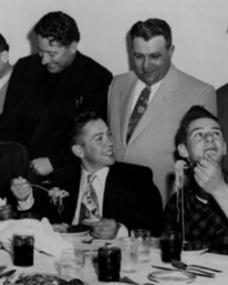 The Smaldones were well known for giving back to the community. In this photo from May 1950, the Smaldones preside over a spaghetti dinner for local youths at Gaetano's restaurant, 3760 Tejon street. Standing are Eugene Smaldone (far left) and Clyde Smaldone (center.